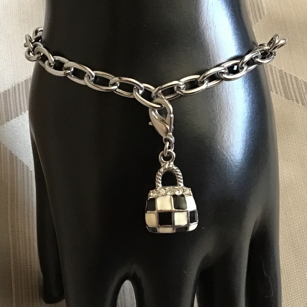 Metal bracelet with black/white purse charm, can be removed